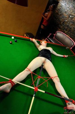 tarra white abused on a pool table